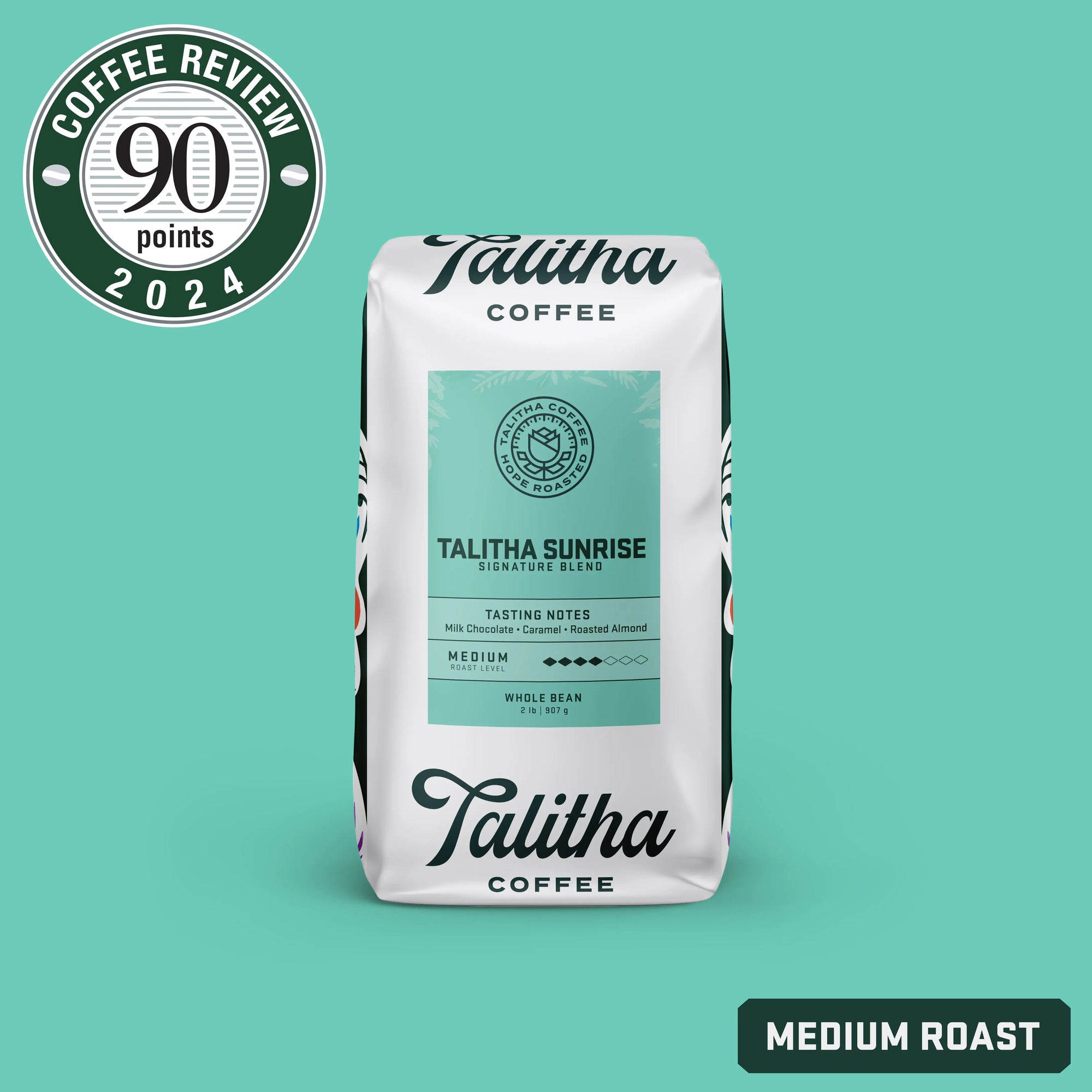 Packaging for Talitha Sunrise coffee with a medium roast designation and a score of 90 points from Coffee Review 2024. The bag features a colorful floral design and provides information about the coffee blend.
