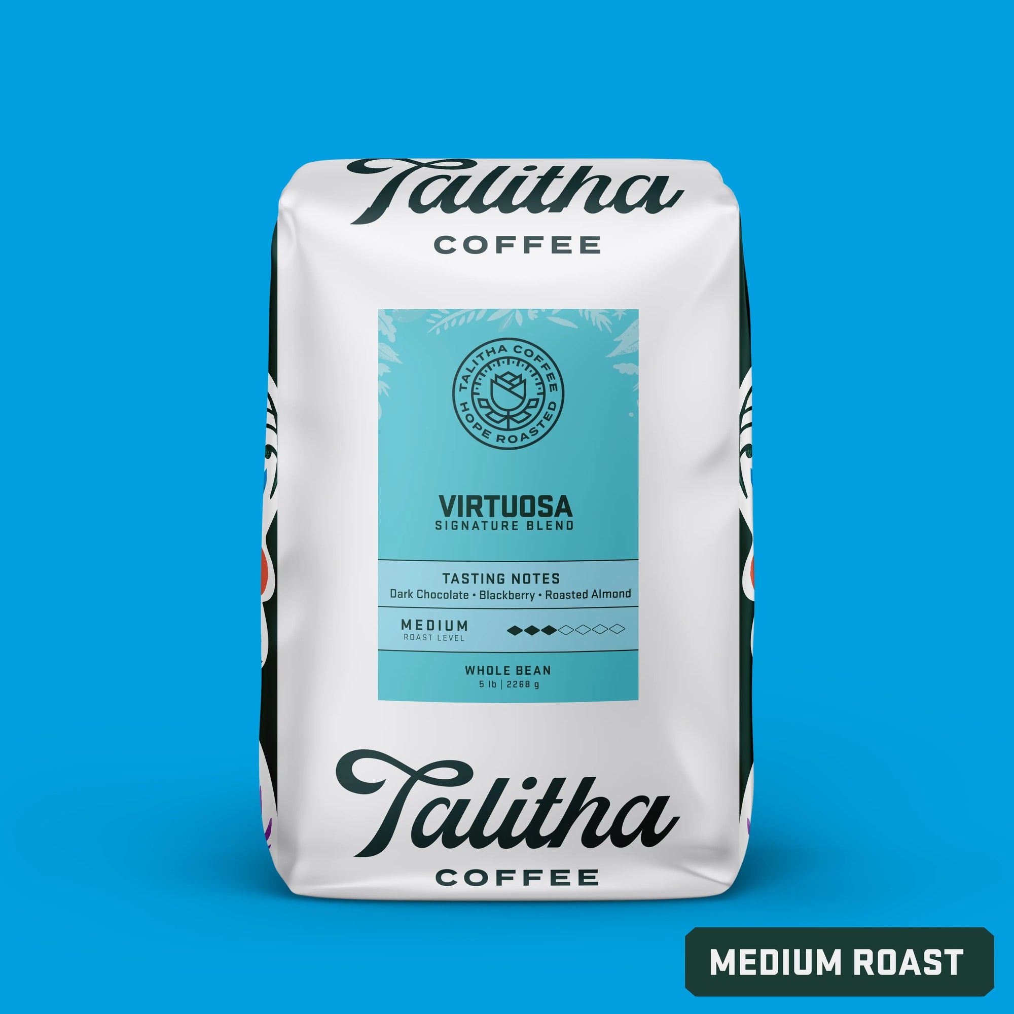 A package of Talitha Coffee's Virtuosa signature blend, indicating medium roast and showing the brand's logo and the words 'signature blend' on the front.